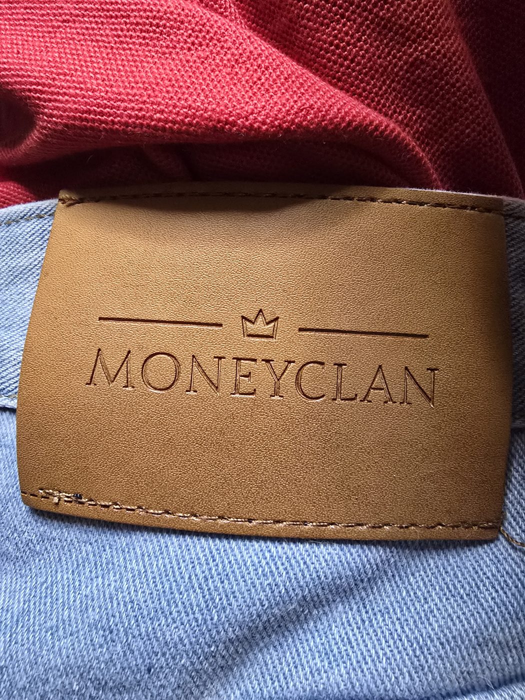 MoneyClan embossed leather patch on denim